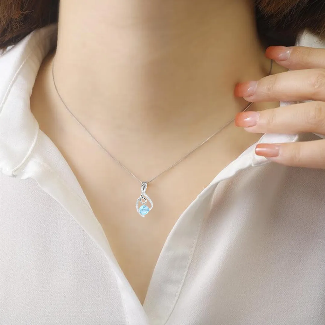 Blue Topaz Treble Clef Music Necklace