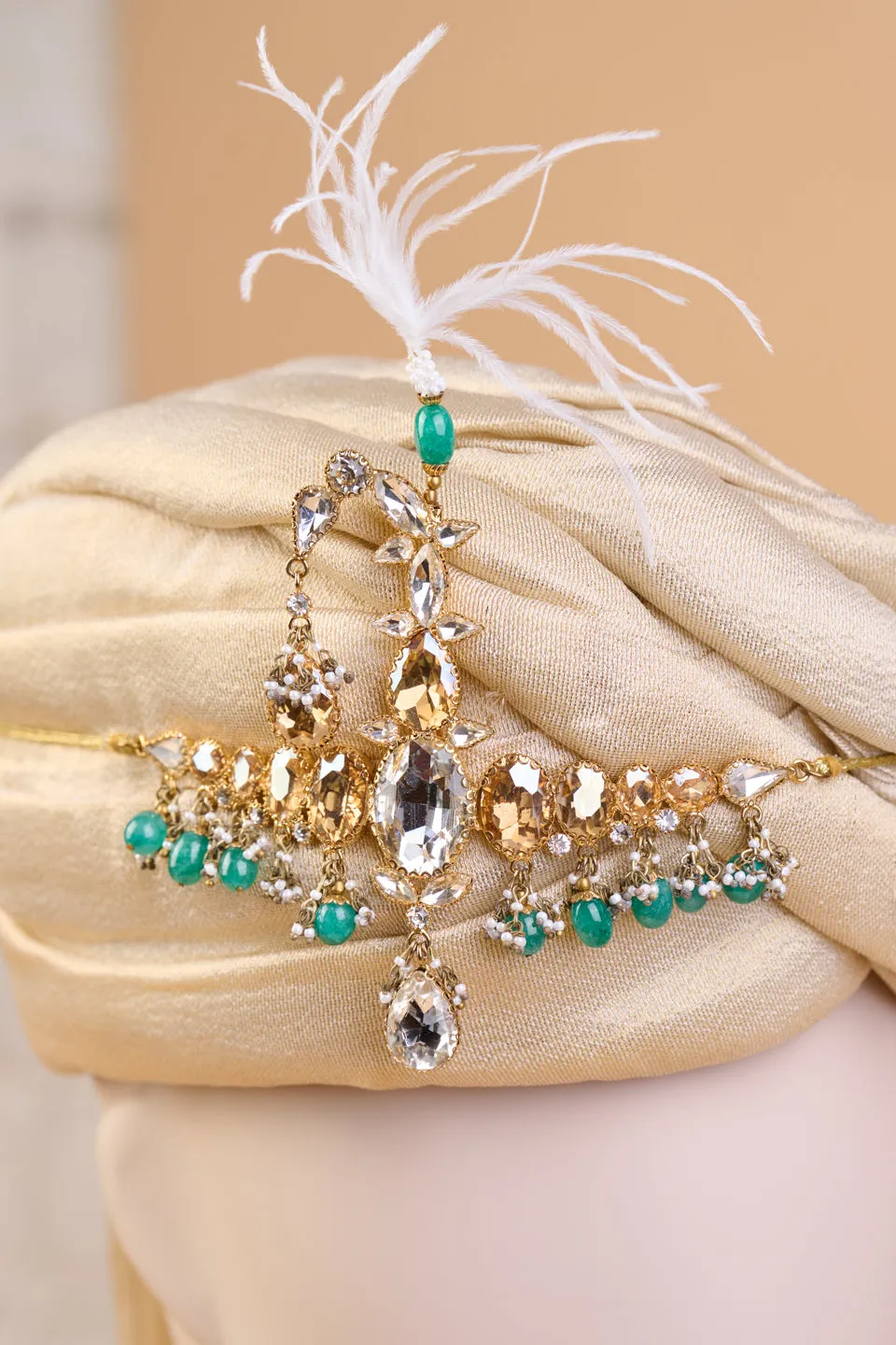 Centre Crystal Sarpech With Emerald Beads & Feather Detail