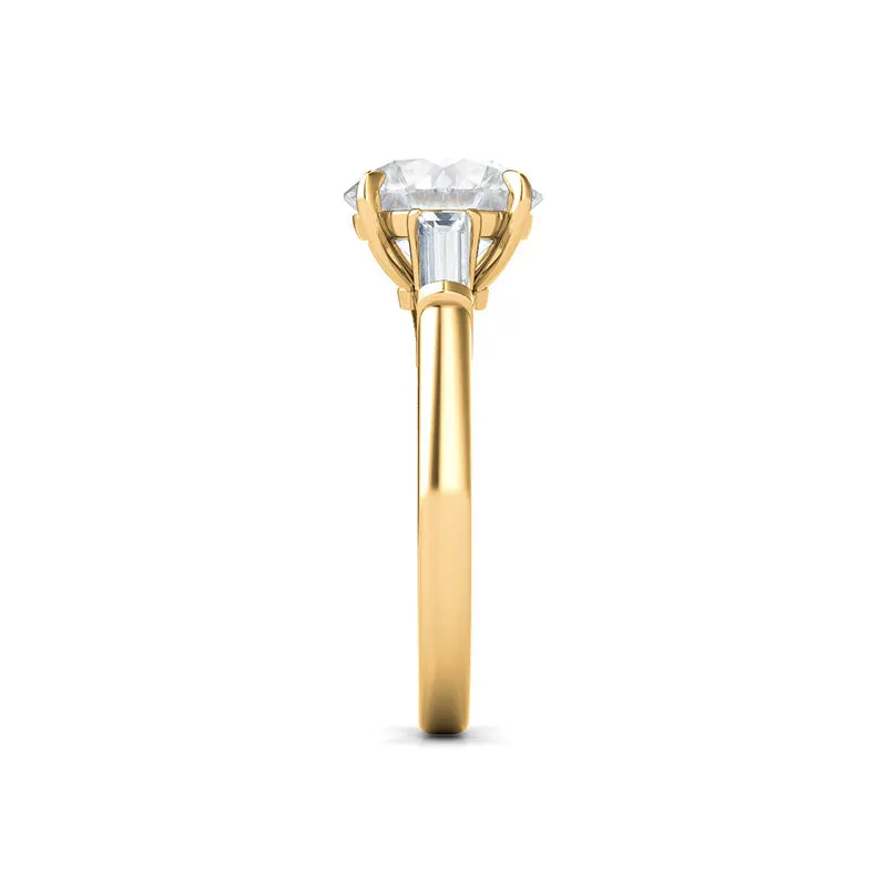 Round Brilliant Cut With Tapered Baguettes Diamond Ring